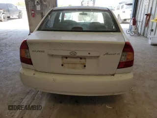 2002 Hyundai Accent GL with VIN KMHCG45C82U380280, listed as a Copart auction lot 79087254 with 173,764 mi miles and Clean Title. Bid and sale history available at carsss.com. Image 6.