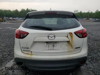 2016 Mazda CX-5 Sport с VIN JM3KE4BY4G0899953, выставлен на аукционе Copart как лот 57269035 с пробегом 196 158 миль миль и Списание • Salvage title. История ставок и продаж доступна на DreamBid. Изображение 6.