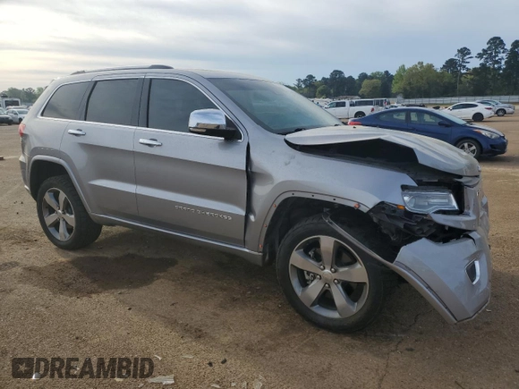 2016 Jeep Grand Cherokee Overland with VIN 1C4RJFCT2GC320247, listed as a Copart auction lot 50832195 with 104,300 mi miles and Salvage title. Bid and sale history available at DreamBid. Image 4.