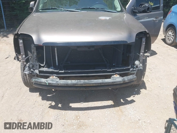2013 GMC Yukon SLT with VIN 1GKS2CE04DR290293, listed as a IAAI auction lot 39620358 with 167,664 mi miles. Bid and sale history available at carsss.com. Image 6.