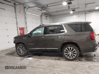 2021 GMC Yukon Denali with VIN 1GKS2DKL8MR409483, listed as a IAAI auction lot 41196214 with 62,684 mi miles. Bid and sale history available at carsss.com. Image 15.