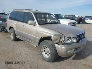 2000 Lexus LX 470 with VIN JT6HT00W0Y0098917, listed as a IAAI auction lot 41937661 with 180,980 mi miles and . Bid and sale history available at DreamBid. Image 1.