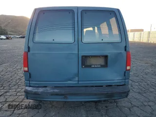 1986 GMC Safari z VIN 1GDDM15Z1GB521872, wystawiony jako Copart lot #87655995 z przebiegiem 30 889 mil mil oraz Szkody całkowita. Historia ofert i sprzedaży dostępna na DreamBid. Obrazek 6.