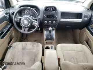 2014 Jeep Compass Sport with VIN 1C4NJDBB9ED670610, listed as a Copart auction lot 52691825 with 150,525 mi miles and Salvage Title. Bid and sale history available at carsss.com. Image 8.