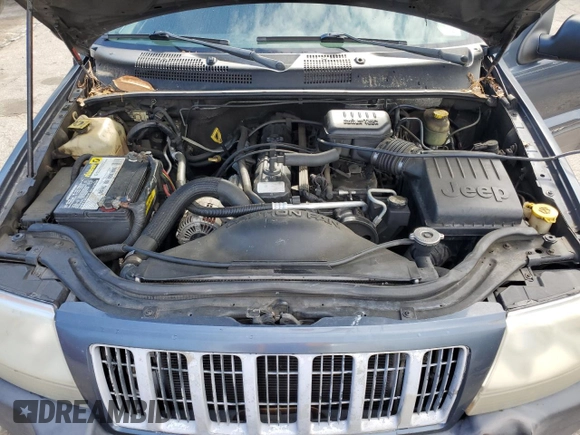 2004 Jeep Grand Cherokee Laredo with VIN 1J4GX48S24C216941, listed as a Copart auction lot 55584785 with 279,710 mi miles and Salvage title. Bid and sale history available at DreamBid. Image 12.