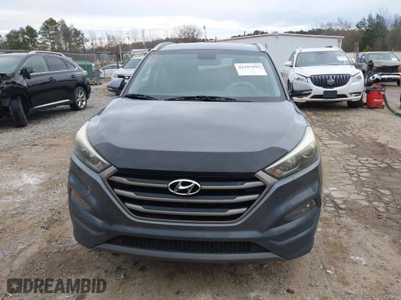 2016 Hyundai Tucson Sport with VIN KM8J33A21GU254828, listed as a IAAI auction lot 41297692 with 134,394 mi miles. Bid and sale history available at carsss.com. Image 12.