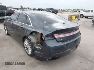 2014 Lincoln MKZ z VIN 3LN6L2G98ER830388, wystawiony jako IAAI lot #42104116 z przebiegiem 108 219 mil mil oraz . Historia ofert i sprzedaży dostępna na DreamBid. Obrazek 3.