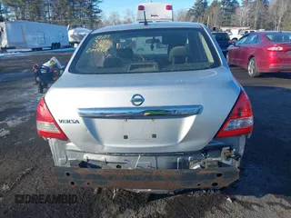 2011 Nissan Versa S with VIN 3N1BC1AP5BL423246, listed as a IAAI auction lot 41329258 with Not provided miles and . Bid and sale history available at DreamBid. Image 14.