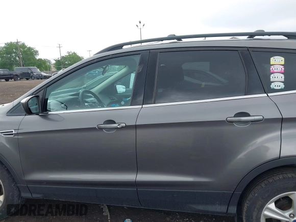 2013 Ford Escape SE with VIN 1FMCU9GX4DUB35629, listed as a IAAI auction lot 42446685 with 103,420 mi miles and . Bid and sale history available at DreamBid. Image 14.
