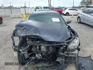 2018 Honda Civic EX with VIN 19XFC2F75JE035935, listed as a IAAI auction lot 41795110 with 92,687 mi miles and . Bid and sale history available at DreamBid. Image 13.