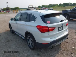 2017 BMW X1 xDrive28i with VIN WBXHT3C39H5F84338, listed as a IAAI auction lot 42400168 with 48,673 mi miles and . Bid and sale history available at DreamBid. Image 3.