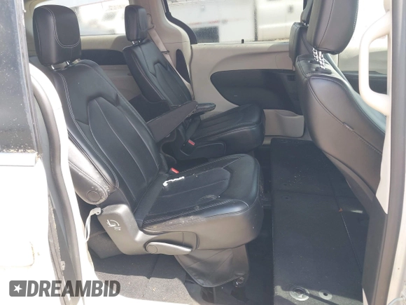 2023 Chrysler Pacifica Touring L with VIN 2C4RC1BG7PR521232, listed as a IAAI auction lot 42087909 with 34,609 mi miles and . Bid and sale history available at DreamBid. Image 8.