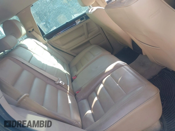 2005 Volkswagen Touareg 4.2L V8 with VIN WVGZM77L25D079655, listed as a IAAI auction lot 42033696 with 187,389 mi miles and . Bid and sale history available at DreamBid. Image 8.