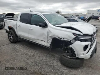 2023 GMC Canyon 4WD AT4 with VIN 1GTP6DEK5P1215120, listed as a Copart auction lot 79029374 with 16,520 mi miles and Salvage Title. Bid and sale history available at carsss.com. Image 4.