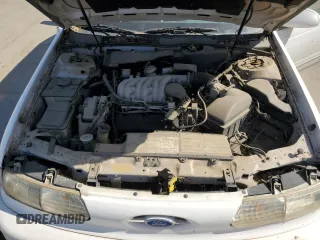 1994 Ford Taurus GL z VIN 1FALP52U7RG261559, wystawiony jako Copart lot #55681304 z przebiegiem 28 675 mil mil oraz Szkoda całkowita • Salvage title. Historia ofert i sprzedaży dostępna na DreamBid. Obrazek 11.