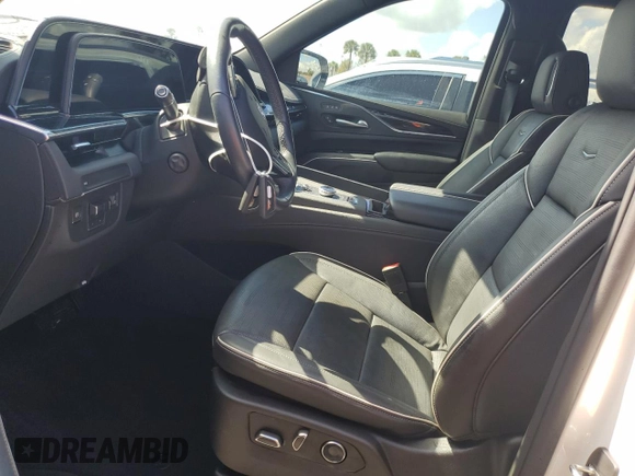 2021 Cadillac Escalade Sport z VIN 1GYS3EKL1MR270077, wystawiony jako Copart lot #74130854 z przebiegiem 21 584 mil mil oraz Szkoda całkowita • Salvage title. Historia ofert i sprzedaży dostępna na DreamBid. Obrazek 7.