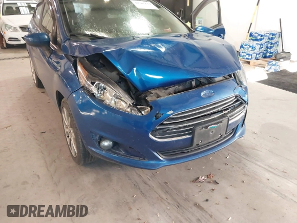 2019 Ford Fiesta SE with VIN 3FADP4EJ6KM124270, listed as a IAAI auction lot 40962134 with 122,757 mi miles. Bid and sale history available at carsss.com. Image 6.