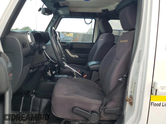 2013 Jeep Wrangler Unlimited Sahara with VIN 1C4BJWEG4DL536694, listed as a Copart auction lot 57714035 with 146,257 mi miles and Salvage title. Bid and sale history available at DreamBid. Image 7.