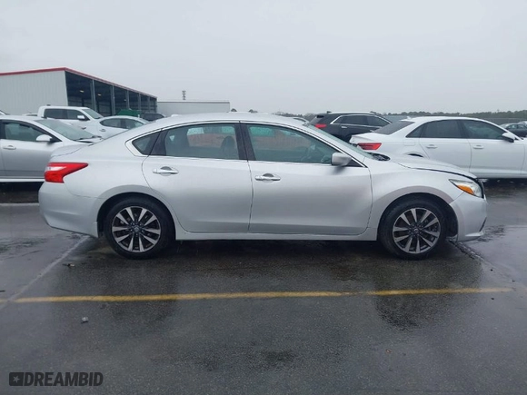 2016 Nissan Altima 2.5 SR with VIN 1N4AL3AP3GC129874, listed as a IAAI auction lot 41582912 with 106,536 mi miles. Bid and sale history available at carsss.com. Image 13.