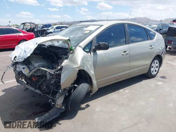2007 Toyota Prius with VIN JTDKB20UX77685207, listed as a IAAI auction lot 42034365 with 133,649 mi miles and . Bid and sale history available at DreamBid. Image 2.