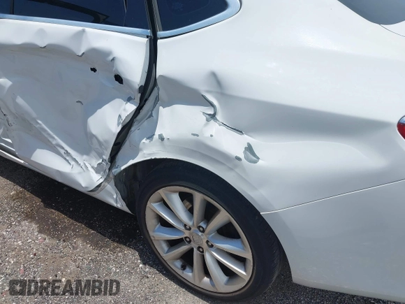 2013 Buick Verano with VIN 1G4PP5SK3D4227957, listed as a IAAI auction lot 42556511 with 242,768 mi miles and . Bid and sale history available at DreamBid. Image 6.