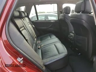 2012 BMW X5 35i z VIN 5UXZV4C56CL749152, wystawiony jako Copart lot #59525155 z przebiegiem 110 773 mil mil oraz Szkoda całkowita • Salvage title. Historia ofert i sprzedaży dostępna na DreamBid. Obrazek 11.