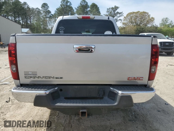 2010 GMC Canyon SLE1 with VIN 1GTDSCDE0A8125702, listed as a Copart auction lot 54183855 with 348,711 mi miles and Salvage title. Bid and sale history available at DreamBid. Image 6.