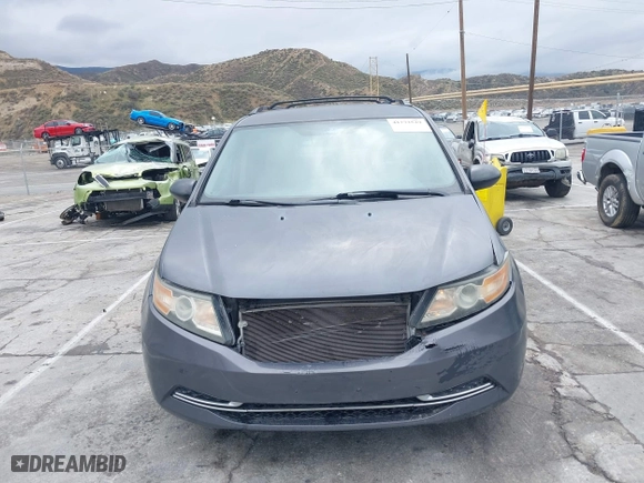2014 Honda Odyssey LX with VIN 5FNRL5H28EB101376, listed as a IAAI auction lot 41772529 with 122,504 mi miles. Bid and sale history available at carsss.com. Image 12.