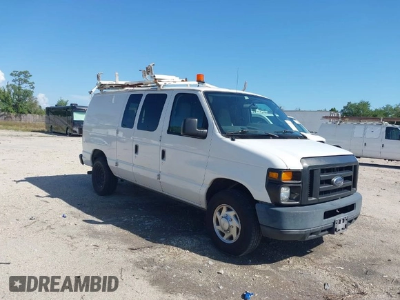 2012 Ford Econoline Cargo Commercial z VIN 1FTNE2EL4CDB10469, wystawiony jako IAAI lot #41861427 z przebiegiem 185 634 mil mil oraz . Historia ofert i sprzedaży dostępna na DreamBid. Obrazek 1.
