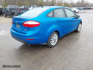 2014 Ford Fiesta SE with VIN 3FADP4BJ6EM204449, listed as a IAAI auction lot 41992813 with 92,026 mi miles. Bid and sale history available at carsss.com. Image 4.