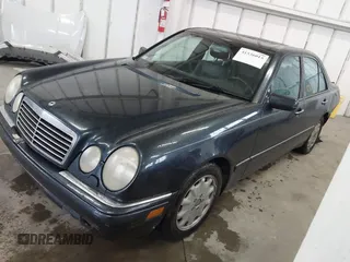 1997 Mercedes-Benz E-Class with VIN WDBJF55F8VA415421, listed as a IAAI auction lot 41536015 with 237,345 mi miles. Bid and sale history available at carsss.com. Image 2.