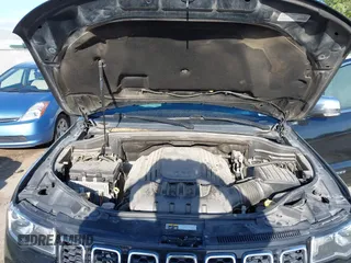 2018 Jeep Grand Cherokee Limited with VIN 1C4RJFBT7JC408526, listed as a IAAI auction lot 42103419 with 103,873 mi miles and . Bid and sale history available at DreamBid. Image 10.