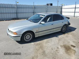 1997 BMW 5 Series 528i with VIN WBADD6320VBW25822, listed as a Copart auction lot 64129485 with 224,882 mi miles and Salvage title. Bid and sale history available at DreamBid. Image 1.