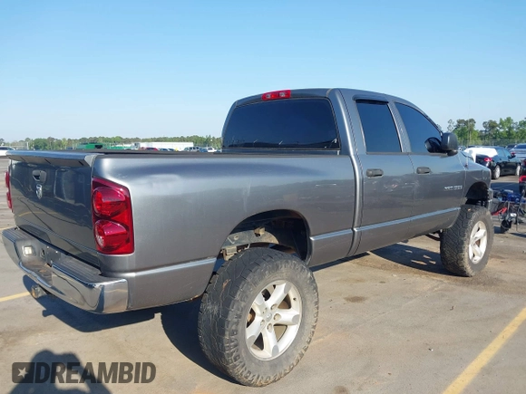 2007 Dodge 1500 SLT with VIN 1D7HU18237J580681, listed as a IAAI auction lot 42054665 with 264,010 mi miles. Bid and sale history available at carsss.com. Image 4.