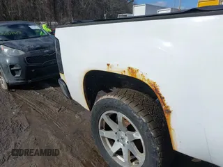 2012 GMC Sierra 1500 SLE z VIN 1GTR2VE75CZ218990, wystawiony jako IAAI lot #41565334 z przebiegiem 189 735 mil mil oraz . Historia ofert i sprzedaży dostępna na DreamBid. Obrazek 17.