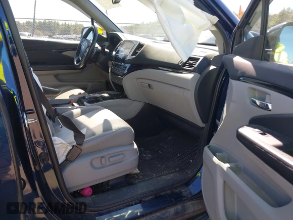 2017 Honda Pilot Touring with VIN 5FNYF6H98HB020341, listed as a IAAI auction lot 42037156 with 73,511 mi miles and . Bid and sale history available at DreamBid. Image 5.