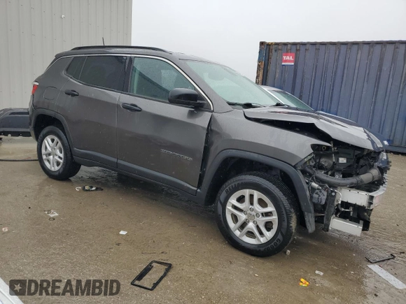 2020 Jeep Compass Sport with VIN 3C4NJDAB8LT210072, listed as a Copart auction lot 54908305 with 104,662 mi miles and Salvage title. Bid and sale history available at DreamBid. Image 4.
