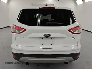 2015 Ford Escape SE with VIN 1FMCU9G90FUB09601, listed as a Copart auction lot 54174665 with 84,560 mi miles and Clean Title. Bid and sale history available at DreamBid. Image 6.