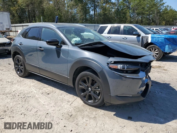 2022 Mazda CX-30 2.5 Turbo Premium Package with VIN 3MVDMBDY1NM437977, listed as a Copart auction lot 50066095 with 44,906 mi miles and Non Repairable. Bid and sale history available at carsss.com. Image 4.