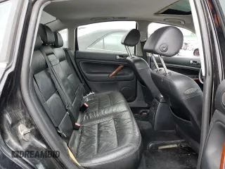 2003 Volkswagen Passat z VIN WVWPH63B53P393111, wystawiony jako Copart lot #44540375 z przebiegiem 188 772 mil mil oraz Czysty tytuł • Clean title. Historia ofert i sprzedaży dostępna na DreamBid. Obrazek 10.