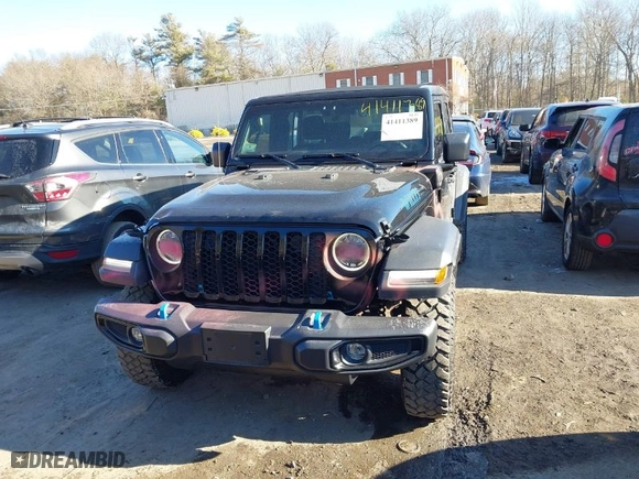 2023 Jeep Wrangler 4xe with VIN 1C4JJXN67PW621024, listed as a IAAI auction lot 41411389 with 21,306 mi miles. Bid and sale history available at carsss.com. Image 12.