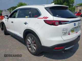 2020 Mazda CX-9 Grand Touring with VIN JM3TCBDY3L0410674, listed as a IAAI auction lot 42389157 with 130,519 mi miles and . Bid and sale history available at DreamBid. Image 3.