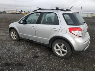 2009 Suzuki SX4 with VIN JS2YB413295101897, listed as a Copart auction lot 76352454 with 123,320 mi miles and Salvage Title. Bid and sale history available at carsss.com. Image 2.