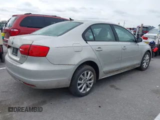 2011 Volkswagen Jetta SE z VIN 3VWDZ7AJ6BM368140, wystawiony jako IAAI lot #40918924 z przebiegiem 198 076 mil mil oraz . Historia ofert i sprzedaży dostępna na DreamBid. Obrazek 4.