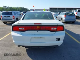 2014 Dodge Charger Police with VIN 2C3CDXAT8EH348719, listed as a IAAI auction lot 42026437 with 140,573 mi miles and . Bid and sale history available at DreamBid. Image 16.