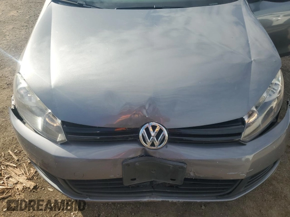 2012 Volkswagen Golf w/Conv & Sunroof z VIN WVWDB7AJ4CW022810, wystawiony jako Copart lot #80911224 z przebiegiem 130 223 mil mil oraz Szkoda całkowita • Salvage title. Historia ofert i sprzedaży dostępna na DreamBid. Obrazek 11.