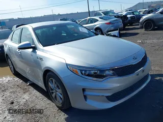 2016 Kia Optima LX with VIN 5XXGT4L34GG078857, listed as a IAAI auction lot 41819971 with 112,963 mi miles. Bid and sale history available at carsss.com. Image 1.