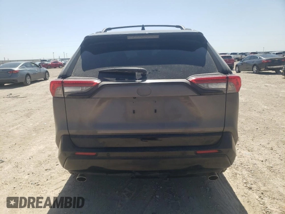 2022 Toyota RAV4 XSE with VIN JTMFB3FV4ND085997, listed as a Copart auction lot 50556935 with 28,662 mi miles and Salvage title. Bid and sale history available at DreamBid. Image 6.