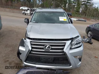 2014 Lexus GX with VIN JTJBM7FX3E5084445, listed as a IAAI auction lot 40640676 with 77,486 mi miles. Bid and sale history available at carsss.com. Image 12.