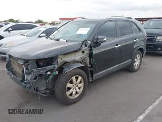 2012 Kia Sorento LX with VIN 5XYKT3A6XCG247528, listed as a IAAI auction lot 42194338 with 123,565 mi miles and . Bid and sale history available at carsss.com. Image 2.